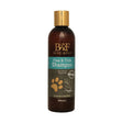 A dark amber glass bottle with gold cap and benji & flo label for equestrian flo flea and tick shampoo