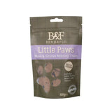 A dark green and purple benji & flo little paws pouch showing chicken flavored meaty groove mobility treats inside