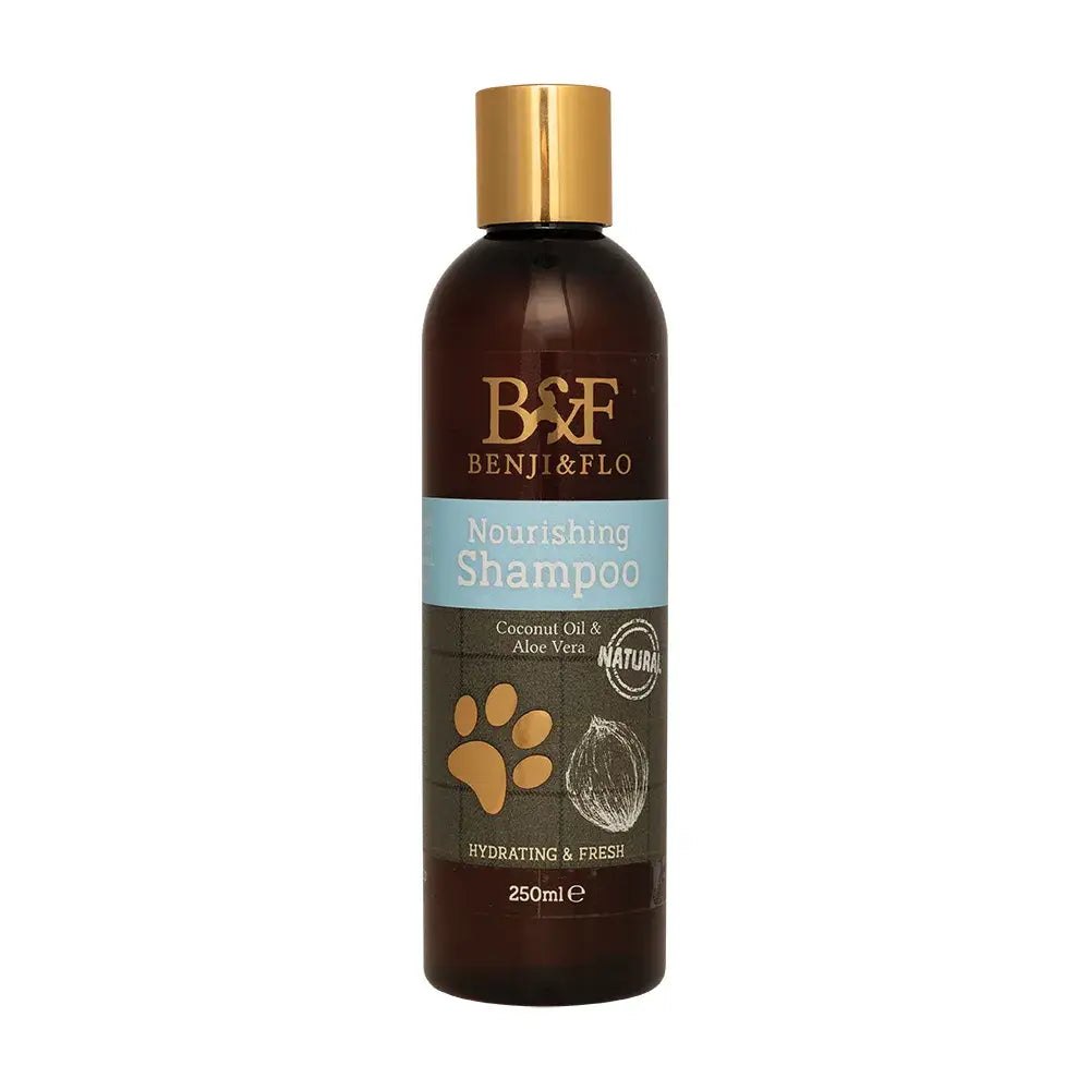 Dark brown bottle of benji and flo nourishing shampoo with gold cap and natural coconut paw print label