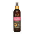 Dark brown glass bottle with gold spray nozzle and pink benji & flo label for flo orchard breeze coat spray