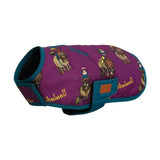 Purple and teal insulated dog coat from benji and flo thelwell collection with cartoon pony illustrations pony friends dog coat