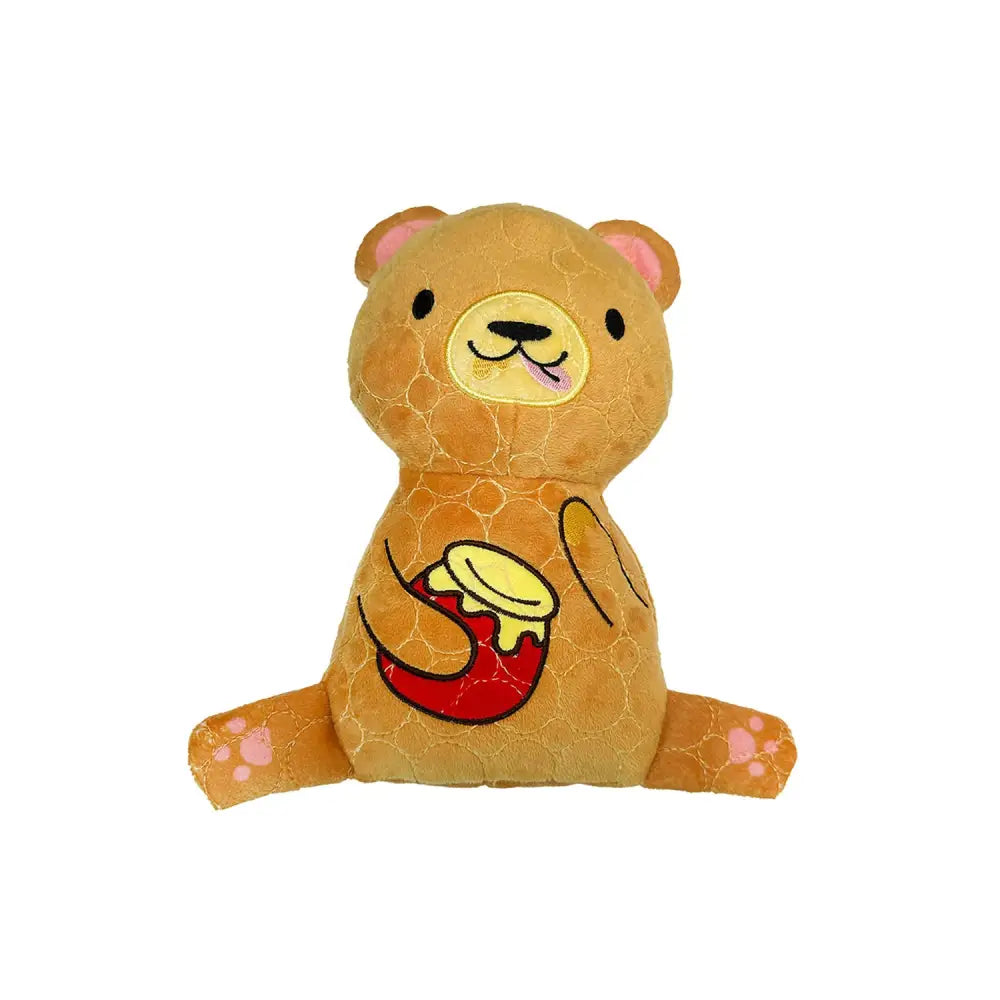 A tan bite force tough plush bear with pink ears and paw pads featuring a red honey pot stitched on its belly