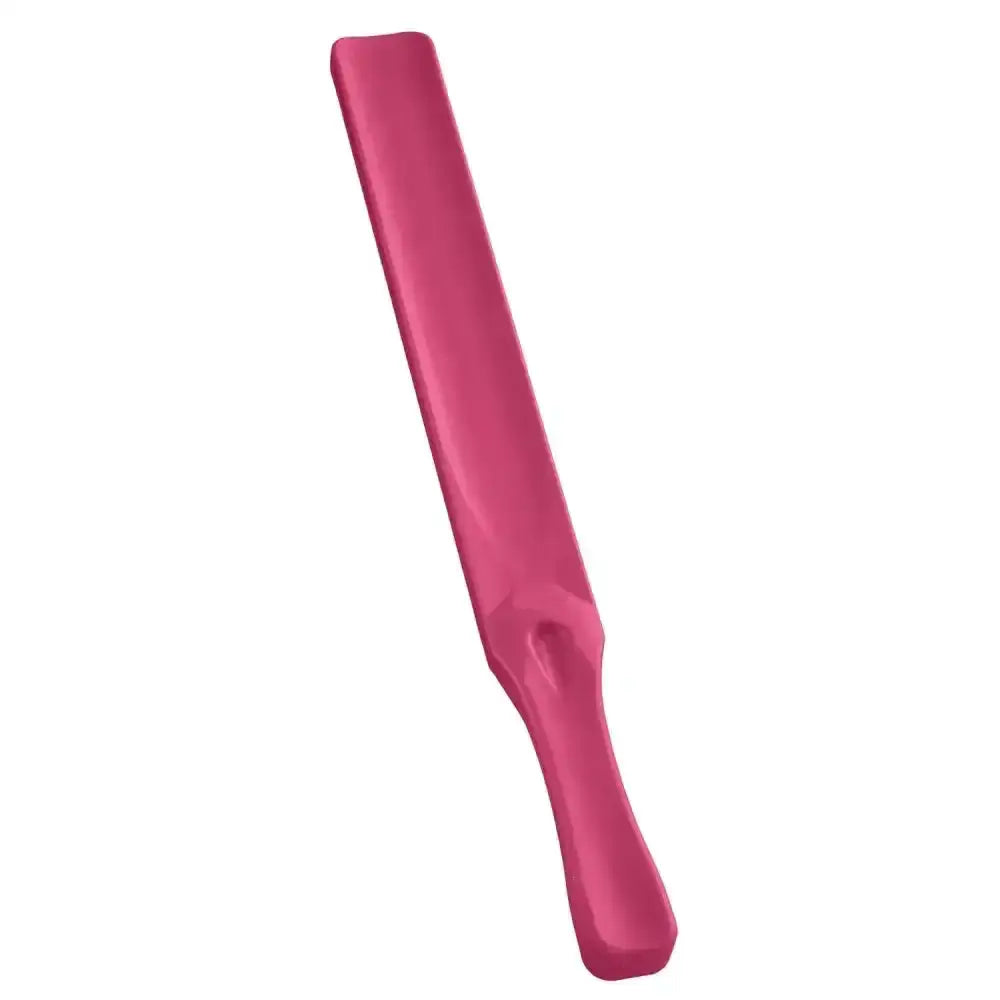 A sleek solid pink plastic bitz feed stirrer with a smooth handle and flat blade for stirring feed easily