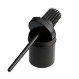 Black plastic hoof oil brush and bitz hoof oil holder with matching bristle brush and threaded lid