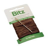 Brown plaiting thread with needle on bitz plaiting card for easy thread crafting and braiding projects