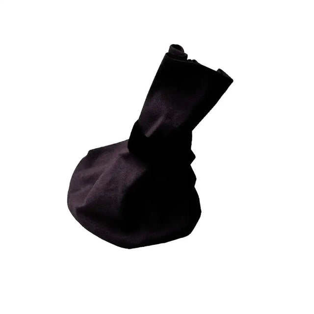 Black fabric bitz poultice boots with snug tapered design and secure velcro fastening for canvas poultice boot use