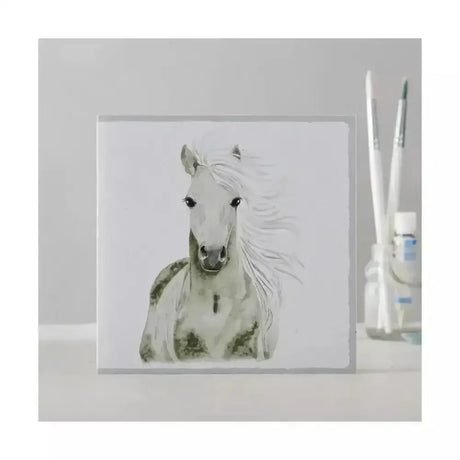 A square white-framed black opal watercolour painting of a dappled gray opal watercolour horse individually cello wrapped