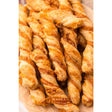 Golden-brown flaky twisted pasties cheese straws with melted cheese filling from blackwells pantry pasties collection