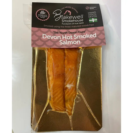 Blakewell smokehouse superior devon hot smoked salmon in vacuum-sealed gold foil pack with pink scalloped label