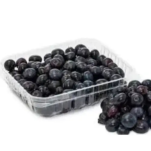 A clear plastic blueberry punnet 113g filled with plump dark blue berries perfect for a healthy snack or equestrian supplies break