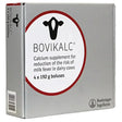 Silver rectangular box of boehringer ingelheim bovikalc calcium supplement for dairy cows with black cow logo and red border