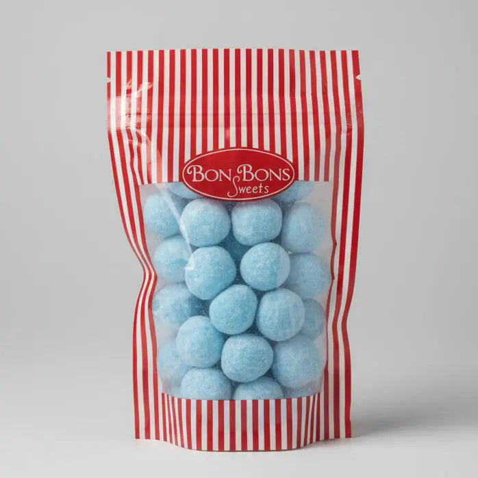 A red and white striped pouch of bon bon sweets pouches with light blue round candies coated in sugar coatings
