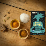 Boom kitchen karma korma premium recipe kit in vibrant teal and black packaging with palm tree graphics
