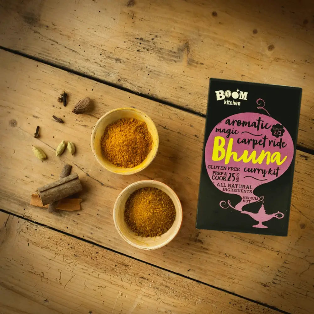 Black and pink boom kitchen magic bhuna curry kit box with whimsical genie lamp design for easy cooking fun