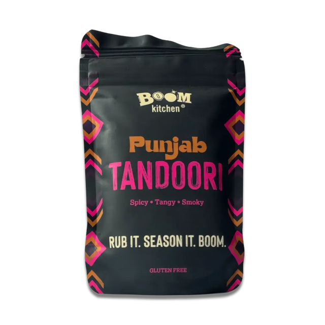 Black boom kitchen punjab tandoori meat rub pouch with vibrant pink and orange geometric patterns on the sides