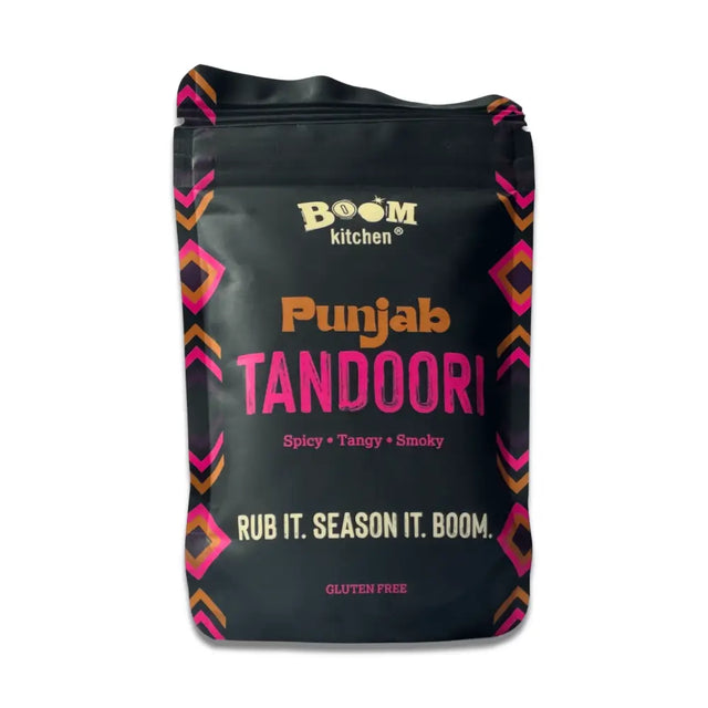 Black boom kitchen punjab tandoori meat rub pouch with vibrant pink and orange geometric patterns on the sides