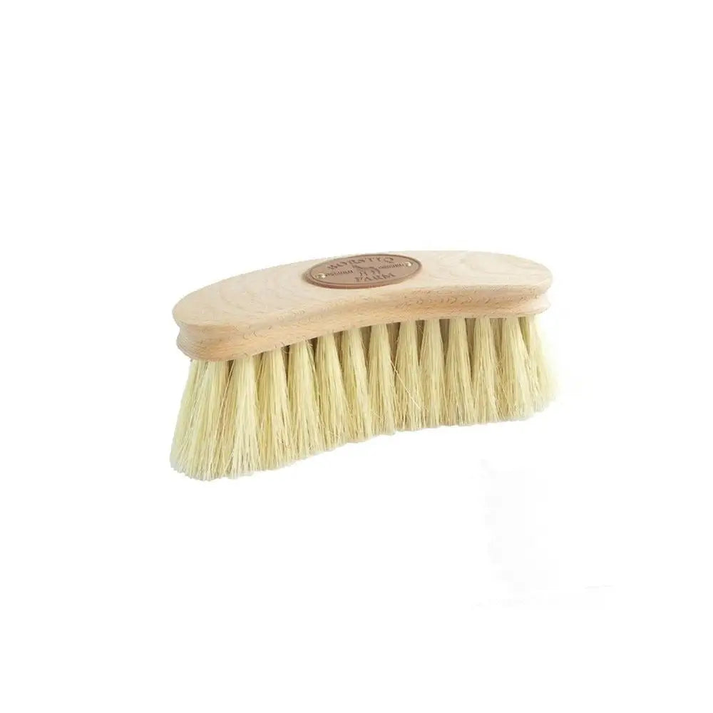 Light-colored borstiq banana mexican fibre brush with natural wood handle and dense pale yellow bristles for grooming