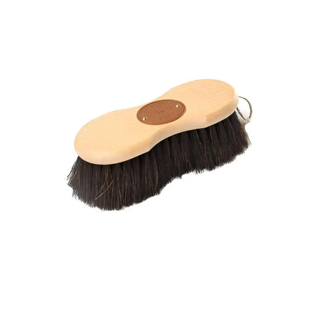 Borstiq shaped arenga brush with a light wooden handle, dense fibre arenga bristles, and a metal ring for hanging