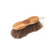 A borstiq shaped finishing brush with a sturdy wooden handle dense dark brown bristles and metal hanging loop