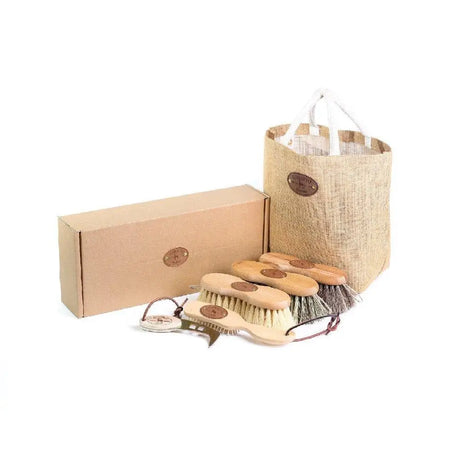 Set of four wooden-handled borstiq shaped original horse brushes with natural bristles and mex fibre brush in burlap tote