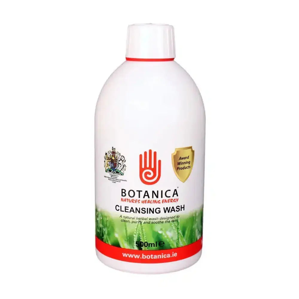White plastic bottle of botanica cleansing wash with red accents and green leafy design featuring natural herbal ingredients