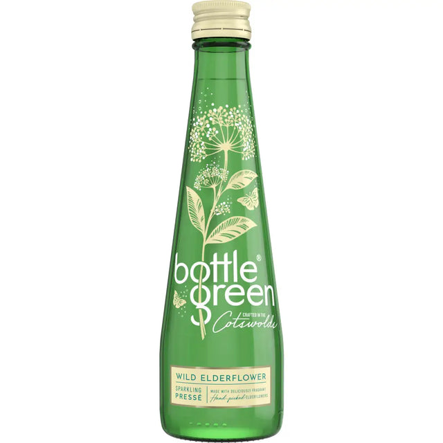 A green glass bottle of bottlegreen elderflower pressé sparkling water with gold foil and a cream cap from cotswold spring
