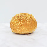 Golden brown bread rolls packs of 2 topped with coarse toasted sesame seeds perfect for snacks or sandwiches