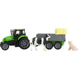 Green plastic breyer farm tractor with black accents and gray tag-a-long wagon carrying hay bales from breyer farms collection