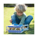 Blue and white wooden breyer farms wooden carry case stable toy with sliding doors showing miniature horses inside