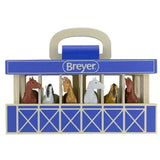 Breyer horse figurines displayed in a blue and beige breyer farms wooden carry case for easy storage and transport