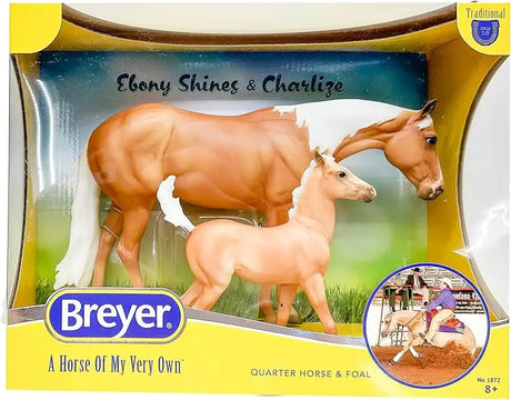 Breyer traditional quarter horse and foal figurines in a clear plastic display box with yellow packaging.