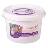 White plastic bucket with purple and white herbilix flystop label showing brinicombe herbilix convenient lick designed for horses