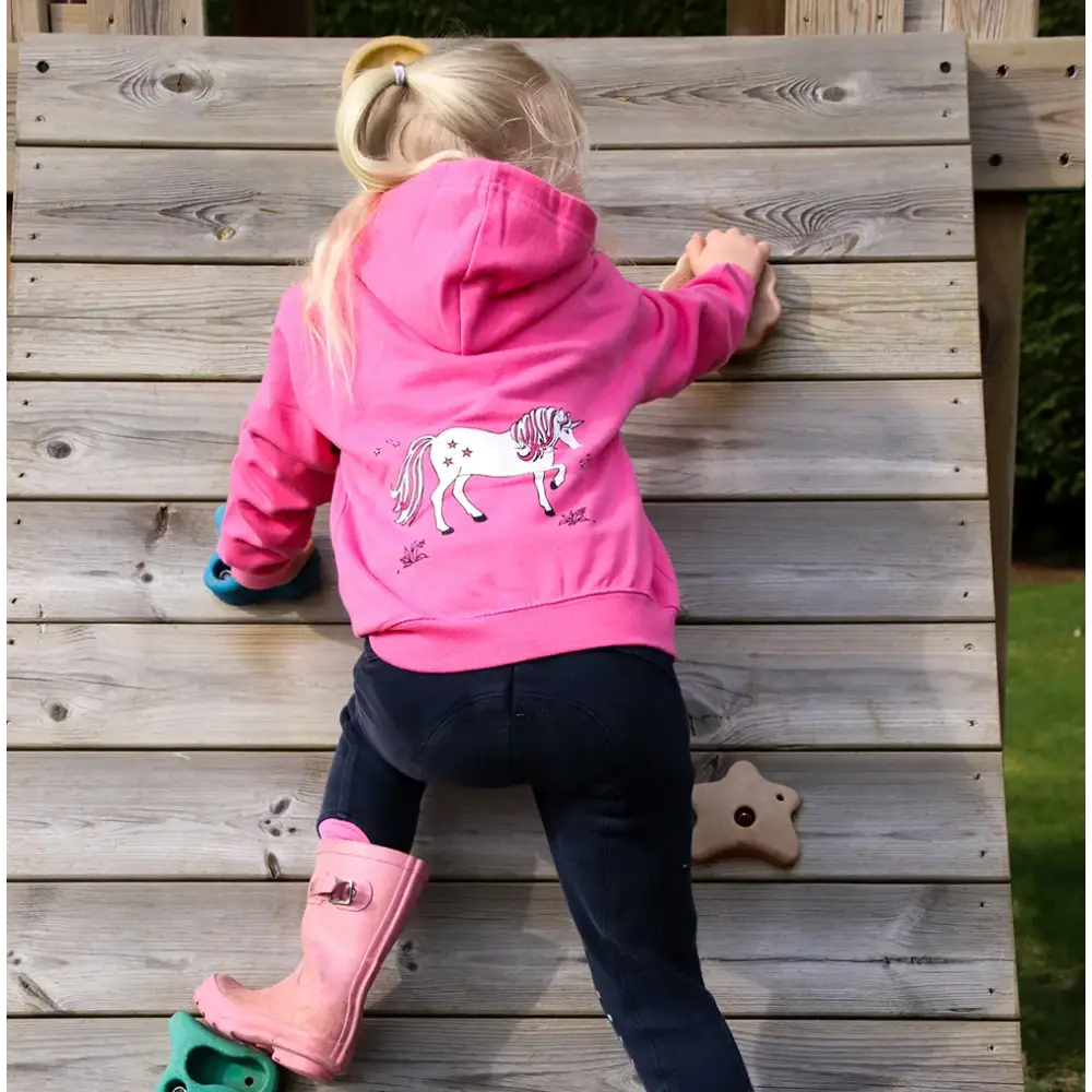 Child in bright pink hoodie featuring a Dancing Unicorn from British Country Collection