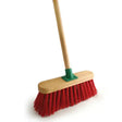 Broom unvarnished red pvc with a 4ft 6in wooden handle and green metal connector for easy cleaning tasks