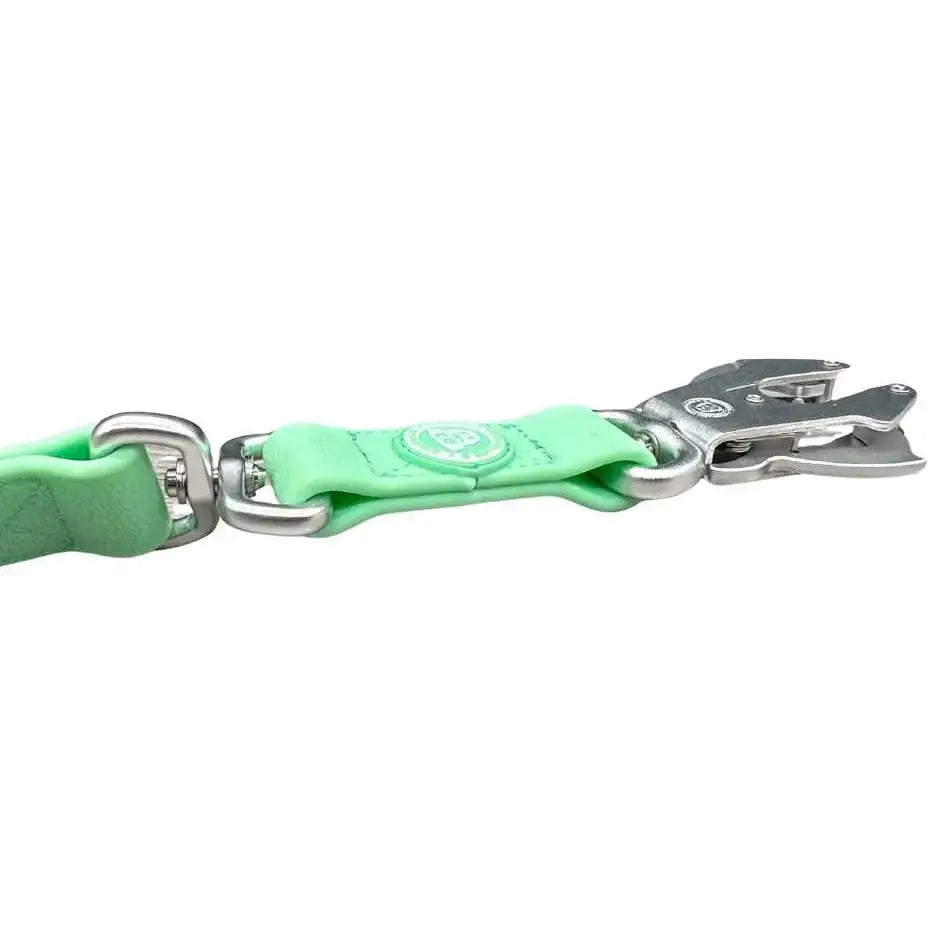 A pastel green btactical lead made of mint green leather with silver pvc frog clip and anti-tangle swivel buckle