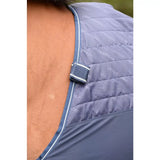 Blue quilted vest with white piping and fabric strap closure from bucas therapy mesh cooler collection