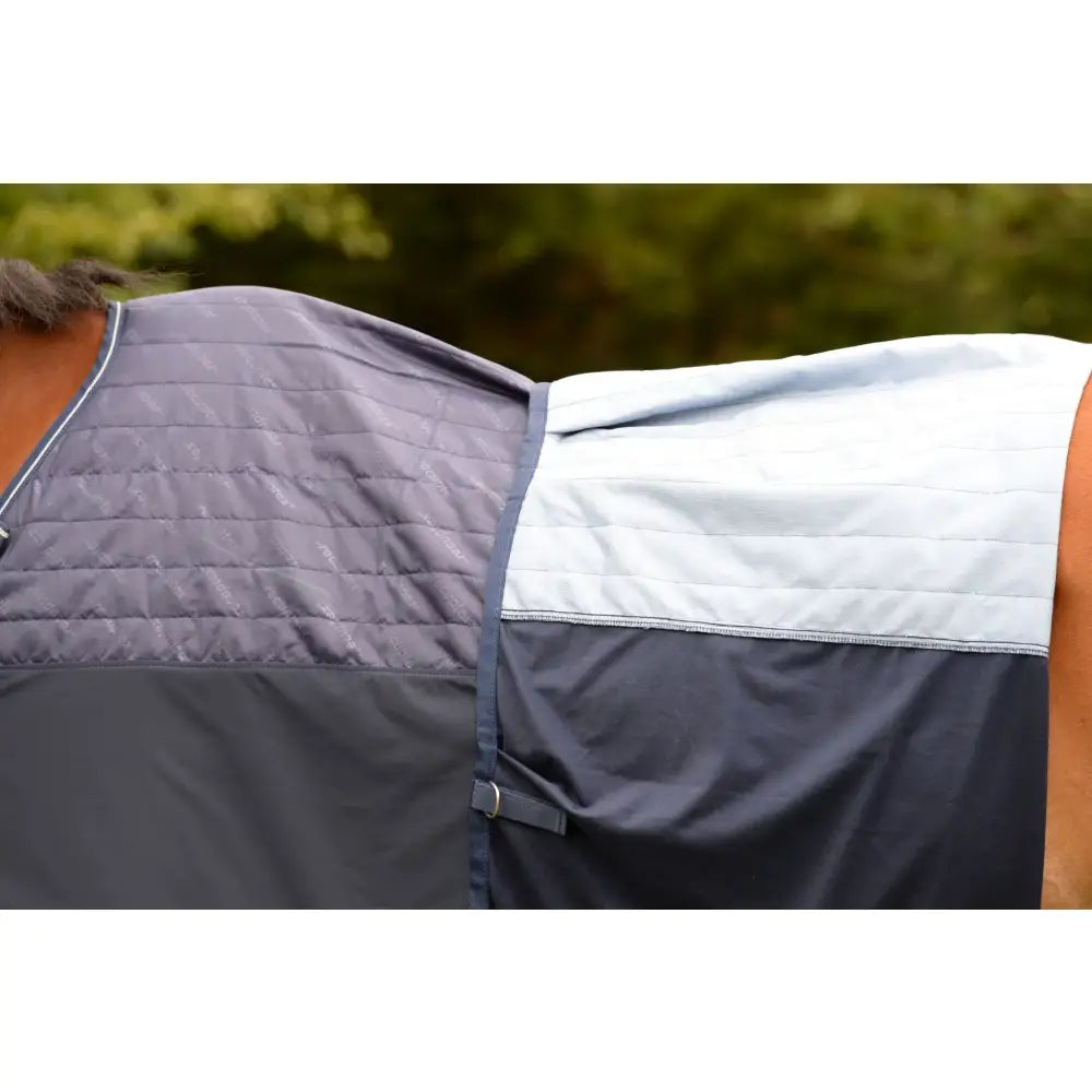 Gray and white quilted horse blanket with dark gray panel, stitched seams, and adjustable straps, bucas therapy mesh cooler