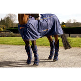 Navy blue bucas therapy travel boots with gold trim ripstop outer and matching leg wraps branded lucas therapy