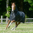 Black bucas trot turnout rug 200g with white trim, multiple straps, silk-feel lining for weather protection