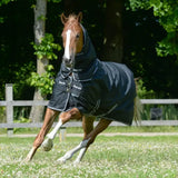 Black bucas trot turnout rug 200g with white trim, multiple straps, silk-feel lining for weather protection