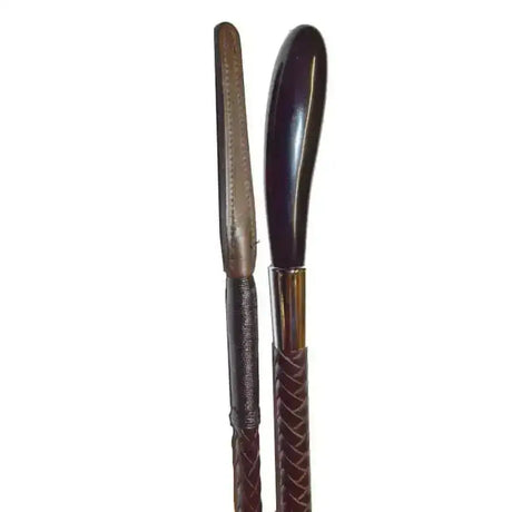 Two dark brown leather shoe horns with braided handles and polished buffalo horn tip stylish cane topped design