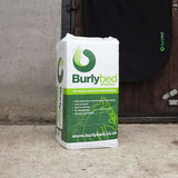 White and green burlybed miscanthus bedding bag with horse silhouette design for natural animal bedding use