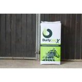 White and lime green burlybed original bag with black horse logo containing miscanthus bedding from environmentally beneficial crop