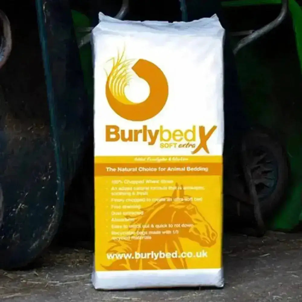 White and yellow burlybed soft extra horse bedding bag with chopped wheat straw and orange flame logo