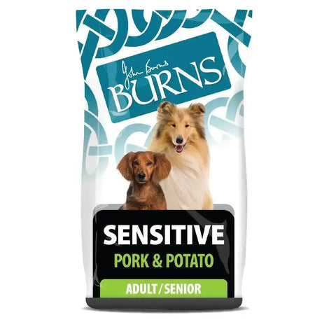 John burns sensitive pork dog food in a white and teal bag with two dogs designed for adult and senior pets