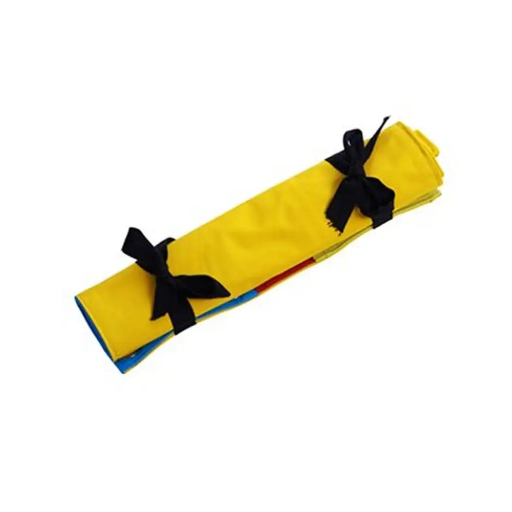A vibrant yellow buster activity mat game spring roll tied with black ribbons showing a colorful interior peek