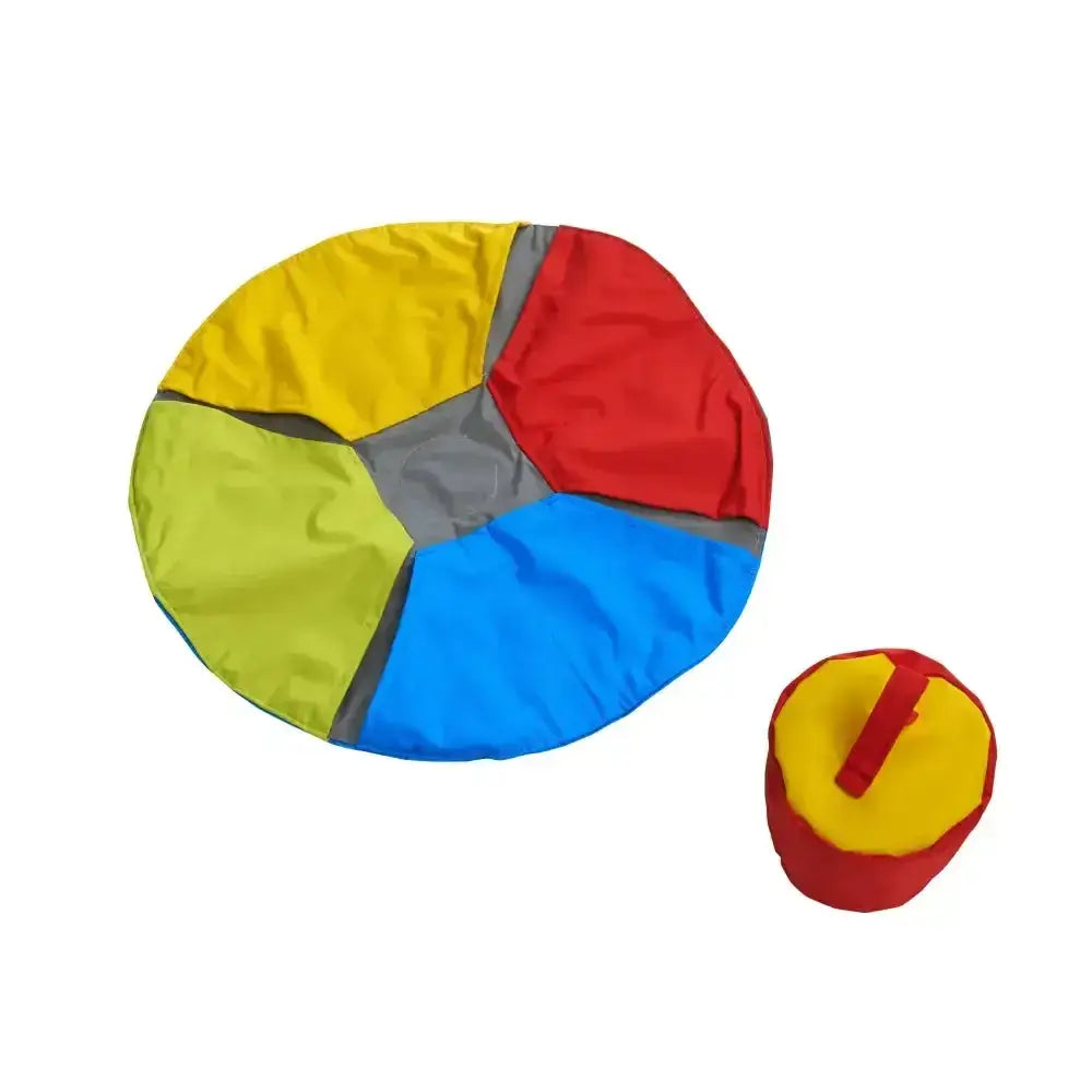 Colorful segmented beanbag chair with red yellow blue and green panels for buster activity mat circular task use