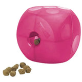 Pink buster soft cube dog toy shaped like dice with white dots and a hole for treats dispensing