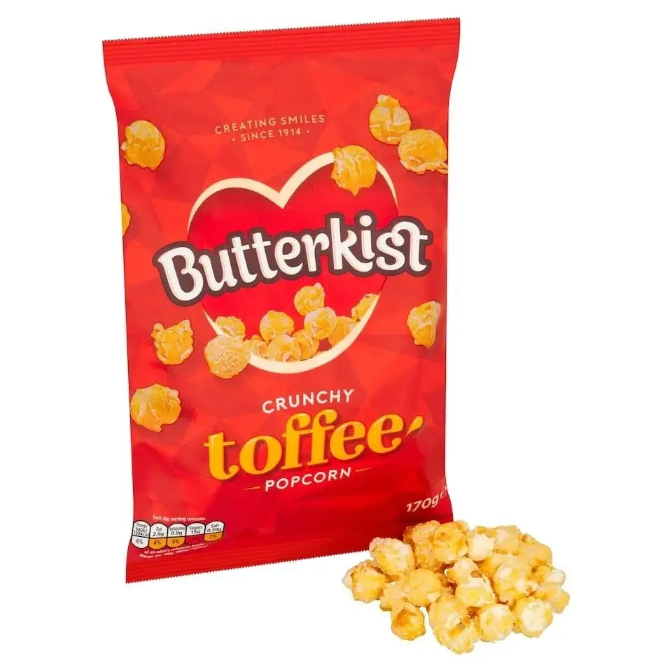 A vibrant red bag of butterkist toffee popcorn with heart logo and golden crunchy toffee popcorn spilling out below