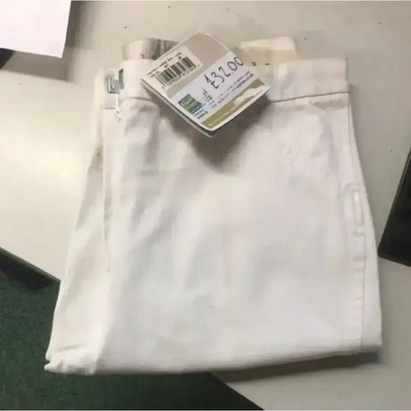 White denim caldene white harrison ladies breeches with visible side logo and attached price tag